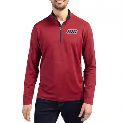 A person wearing a red long-sleeve quarter-zip shirt with the 